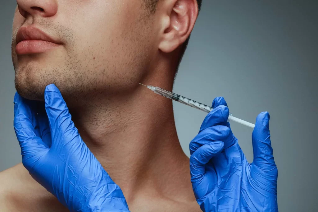 a man getting a neurotoxin injection in his face